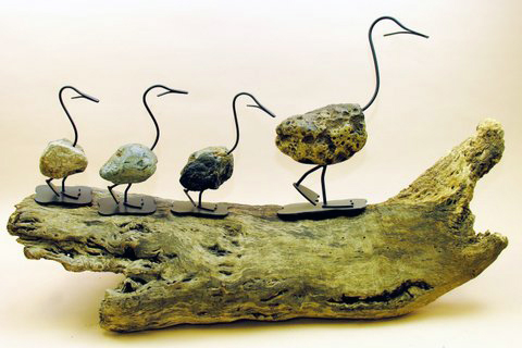 Mama-duck-with-babies-on-driftwood-3